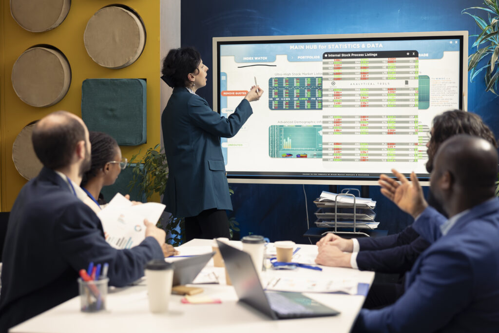 Everyone looking at a large screen